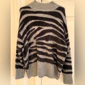 Zebra print fuzzy sweater size M